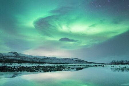 Celebrate Beneath the Aurora in Arctic Norway and Finland | Travel with Aurora Nights